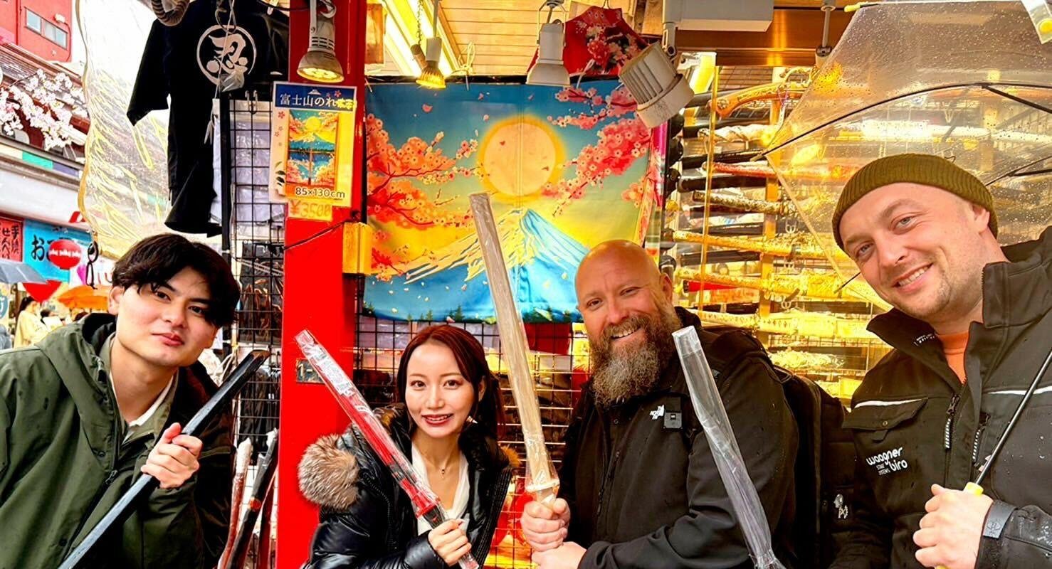 Tour group exploring a retro shopping street in Asakusa with traditional Japanese souvenirs