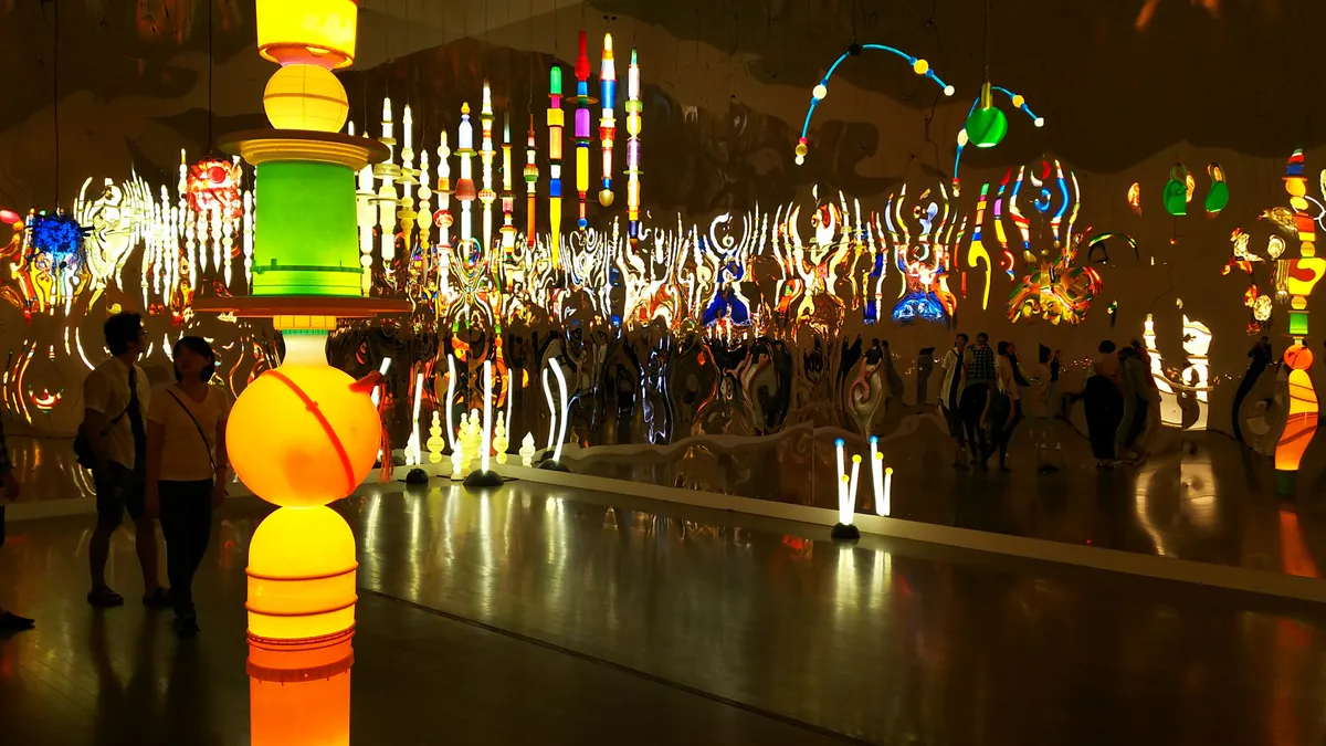 Colorful glowing art installation inside the 21st Century Museum of Contemporary Art in Kanazawa