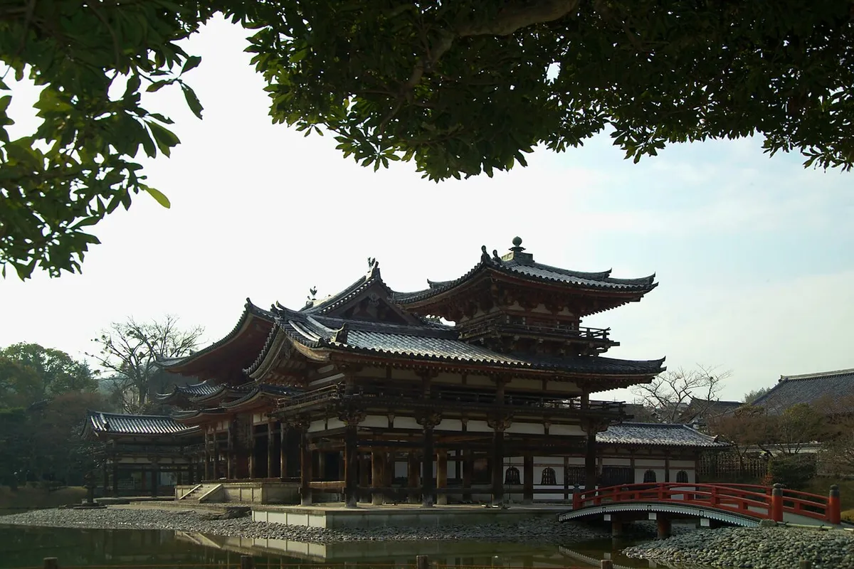 Phoenix Hall of Byodo-in reflected in its pond in Uji